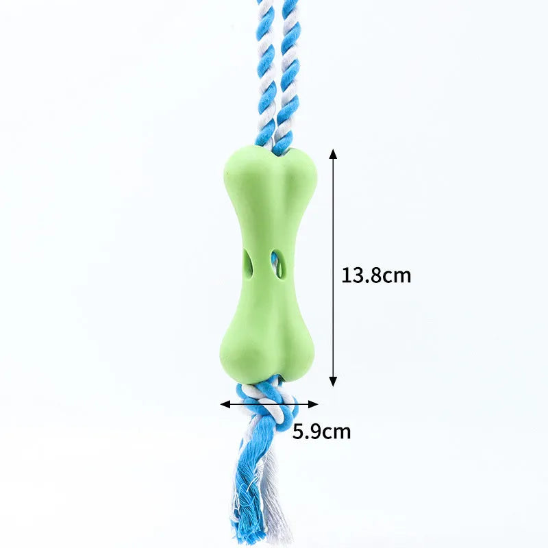 Green porous bone dog chew toy with rope knot texture for treat insertion and dental stimulation