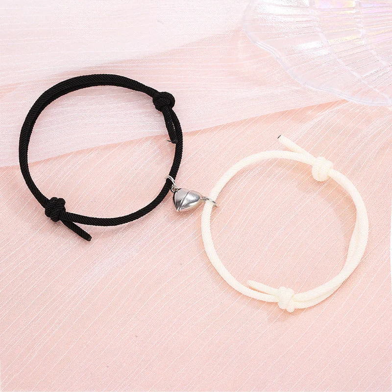 Fashionable magnetic couple bracelets with heart-shaped charms in various color options