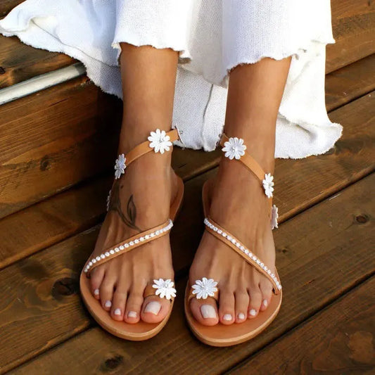 Brown women's Roman sandals with floral pattern, herringbone toe design, artificial PU upper and rubber sole