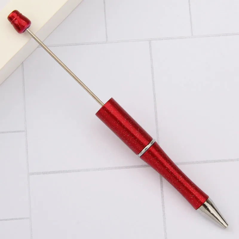 Rotating bead ballpoint pen in gradient colour with ABS plastic and steel wire construction