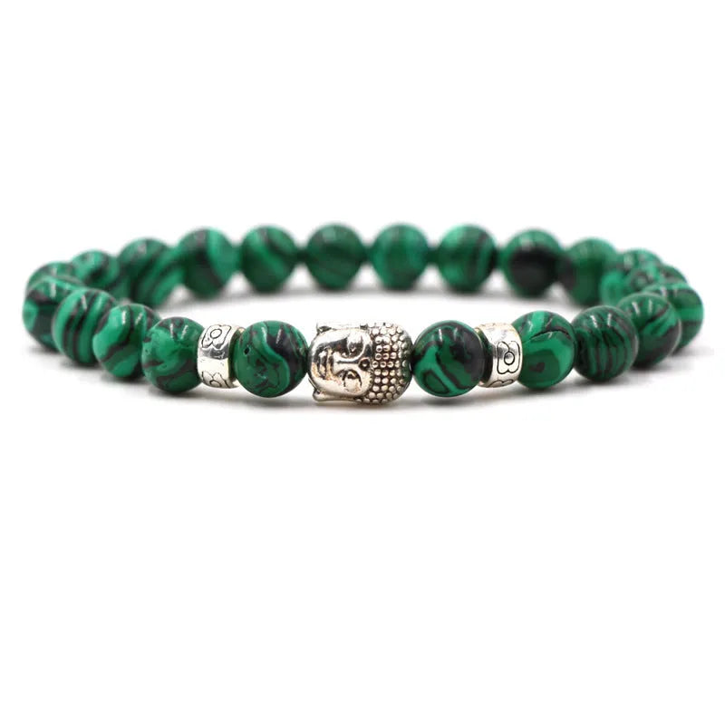 Natural stone stretch bracelet with round beads in various colours including Tigereye and turquoise.