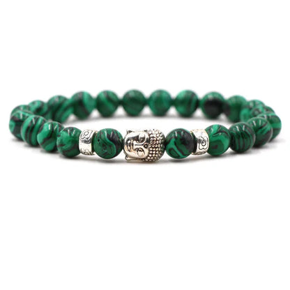 Natural stone stretch bracelet with round beads in various colours including Tigereye and turquoise.