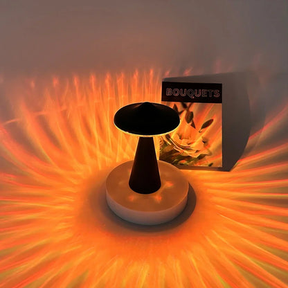 Black or white UFO-shaped night light with USB charging port and LED illumination