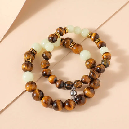 Amber geometric couple bracelets with luminous elements and retro patterning