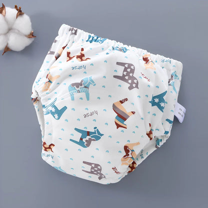 Washable baby training pants with 6-layer gauze construction in assorted patterns including animals and geometric designs