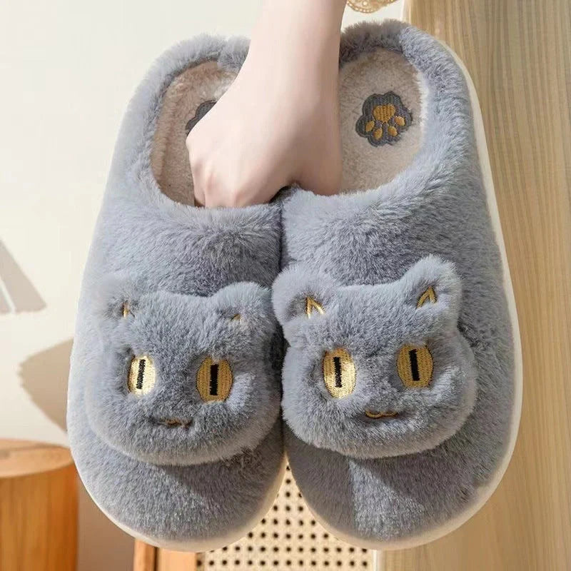 Cozy cat-themed plush slippers with soft, plush fabric and memory foam insoles for comfortable all-day wear