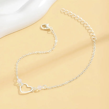 Women's adjustable heart anklet jewellery in gold or silver alloy with geometric design