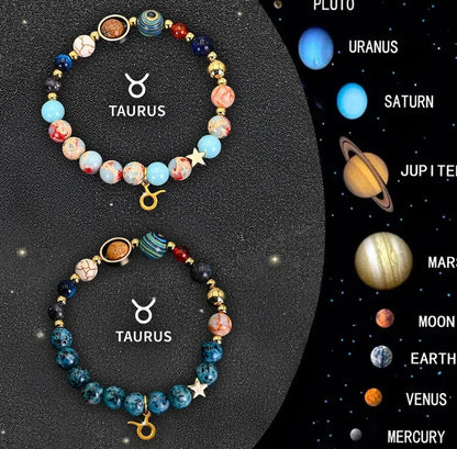 Set of two natural stone beaded bracelets showing zodiac sign designs on an elastic cord.