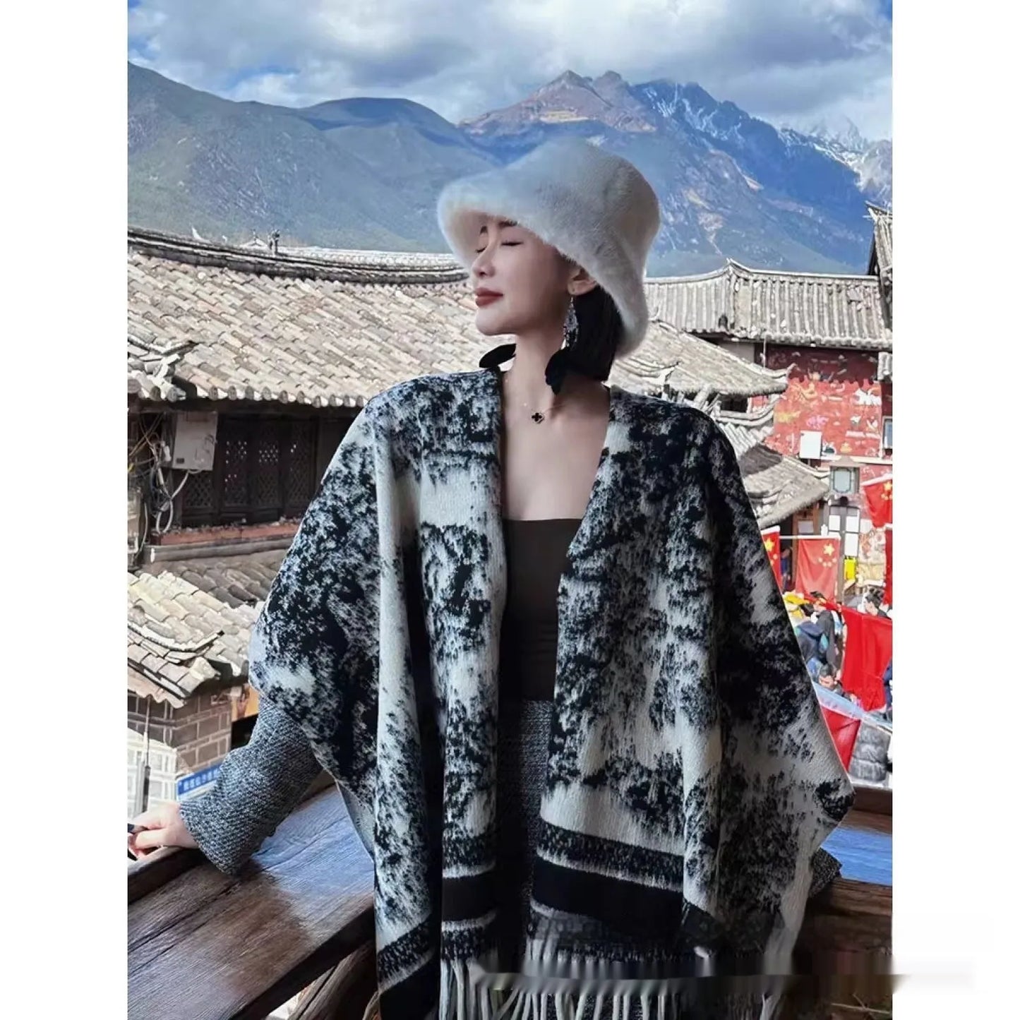 Women's polyester tassel scarf cape in free-size design showing 15 cm fringe detailing and shawl-style drape