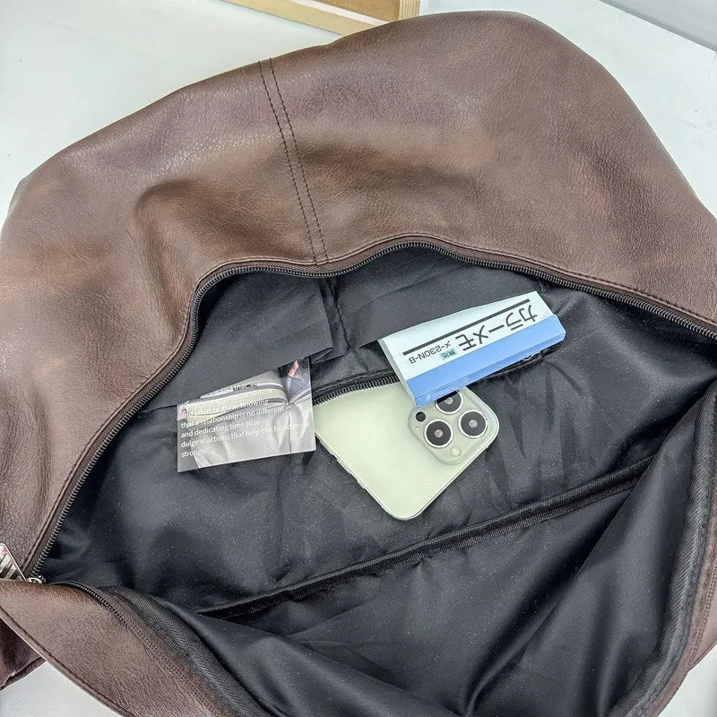 Retro style brown men's crossbody messenger bag showing storage compartments and 50cm width dimensions