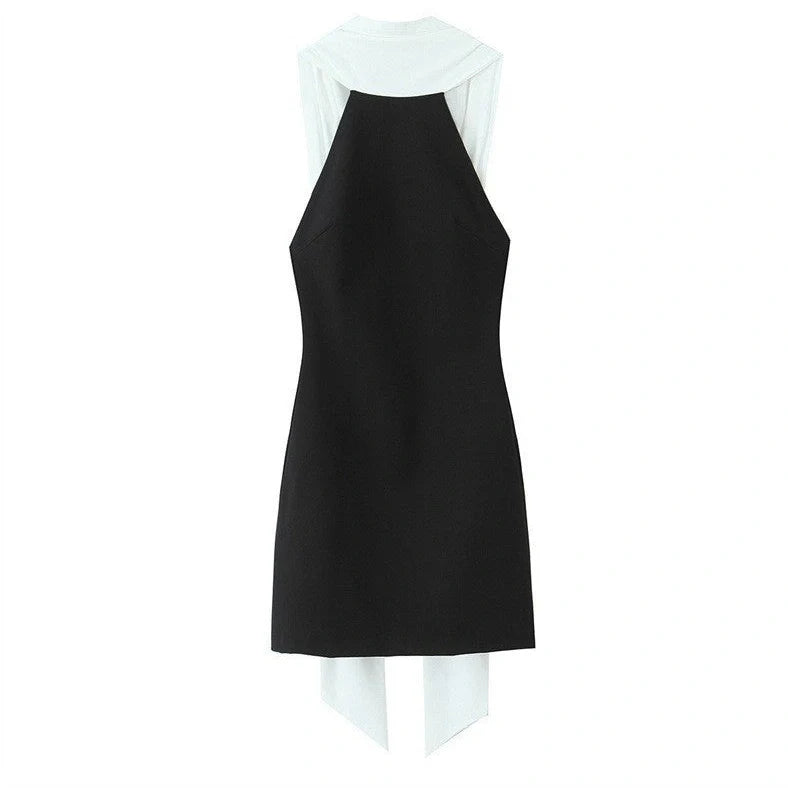 Slim-fitting black patchwork halter dress with asymmetric skirt and high waist detail