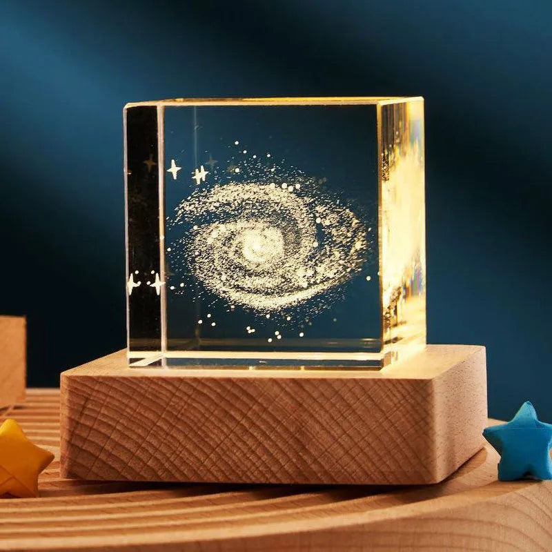 3D crystal cube night lamp showing transparent glass with internal engraving and warm light illumination