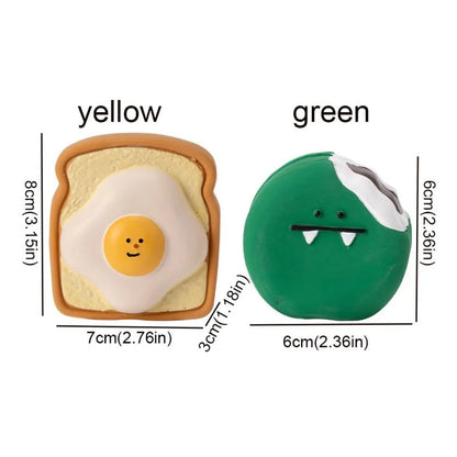 Green and yellow cartoon egg bread shaped latex dog chew toy with squeaker.