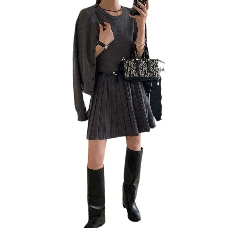 Women's grey art retro vest skirt and long-sleeved cardigan set with 3D pattern and adjustable belt.