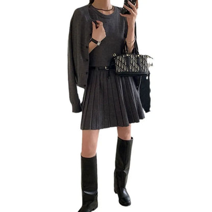 Women's grey art retro vest skirt and long-sleeved cardigan set with 3D pattern and adjustable belt.