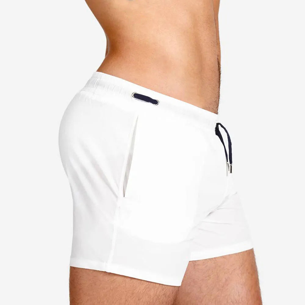 Athletic sports shorts in Army Green colour with visible mesh lining and elastic waistband with drawcord.
