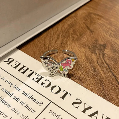 Copper women's ring with Chinese butterfly design and adjustable open loop.