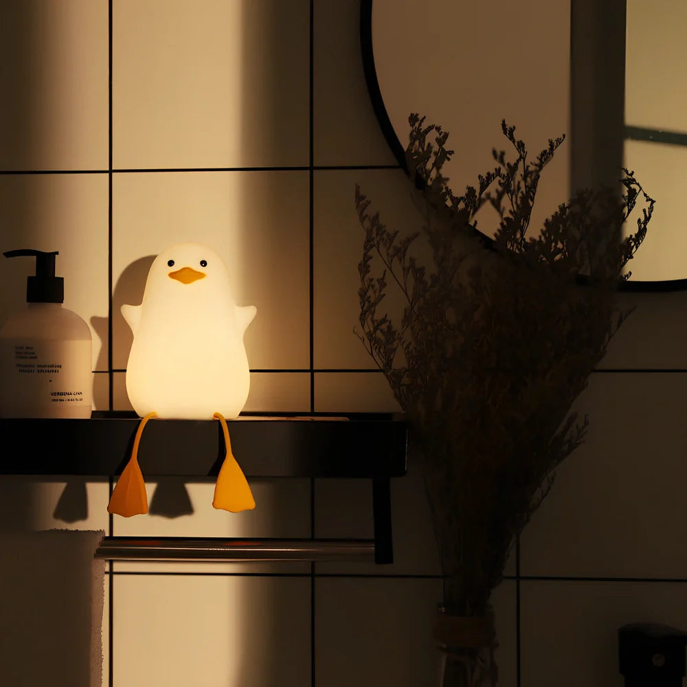 Seagull-shaped silicone night light in blue or yellow measuring 96.5×91×130mm with tap controls