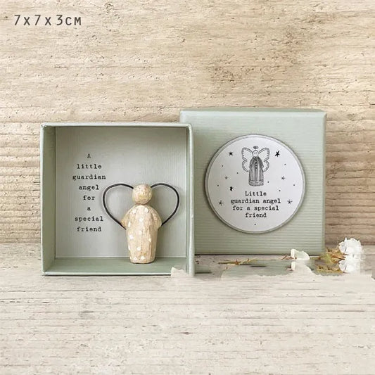 Boxed resin Guardian Angel ornament with modern design in multiple style options