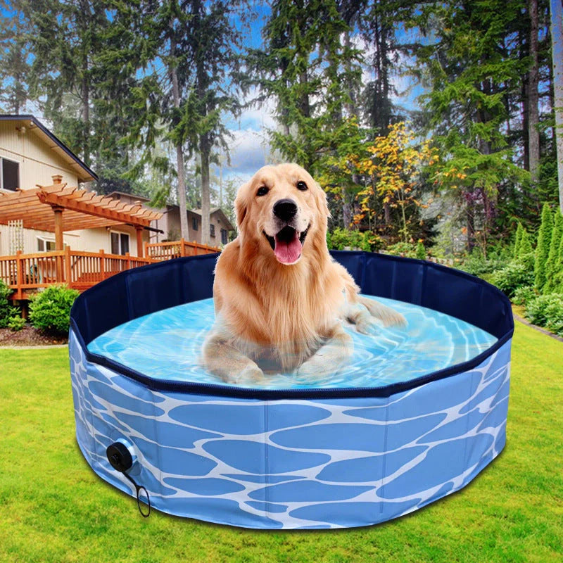 Collapsible dog pool with drain for easy water removal, available in blue water pattern and red sea wave designs