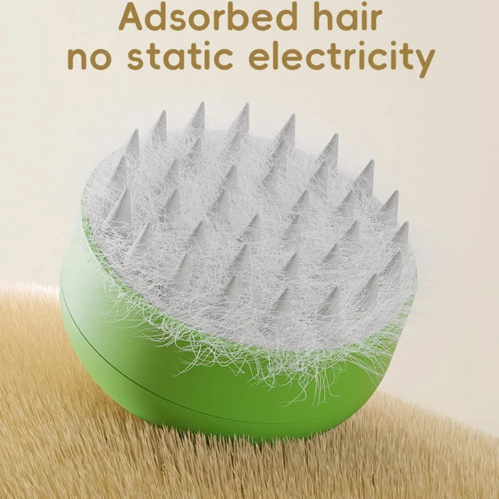 Green and yellow cat steam brush with silicone bristles for grooming pets, measuring 85x85x52mm