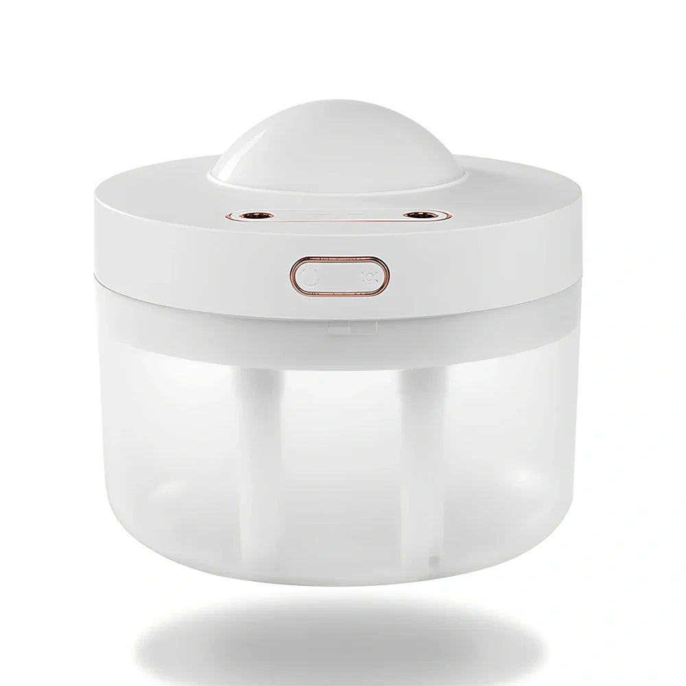White portable humidifier with rotating projection light showing blue illumination and dual spray mist output