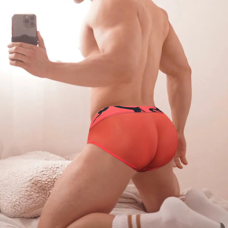 Men's low waist boxer shorts in breathable modal mesh, solid black, pink or red, sizes M to XXL