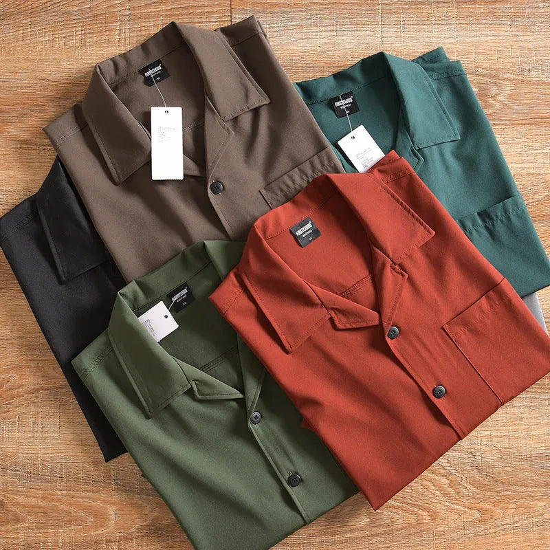 Men's casual short sleeve shirt in lightweight pure cotton fabric, loose Japanese fresh style, non-ironing process, available in Army Green, Black, Brick Red, Brown, Gray, Green for summer leisure wear in sizes M to 3XL