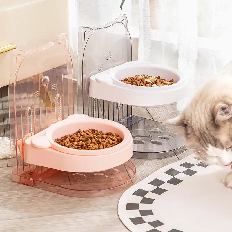 Grey adjustable height cat feeding bowl with removable cat ears and anti-spill barrier