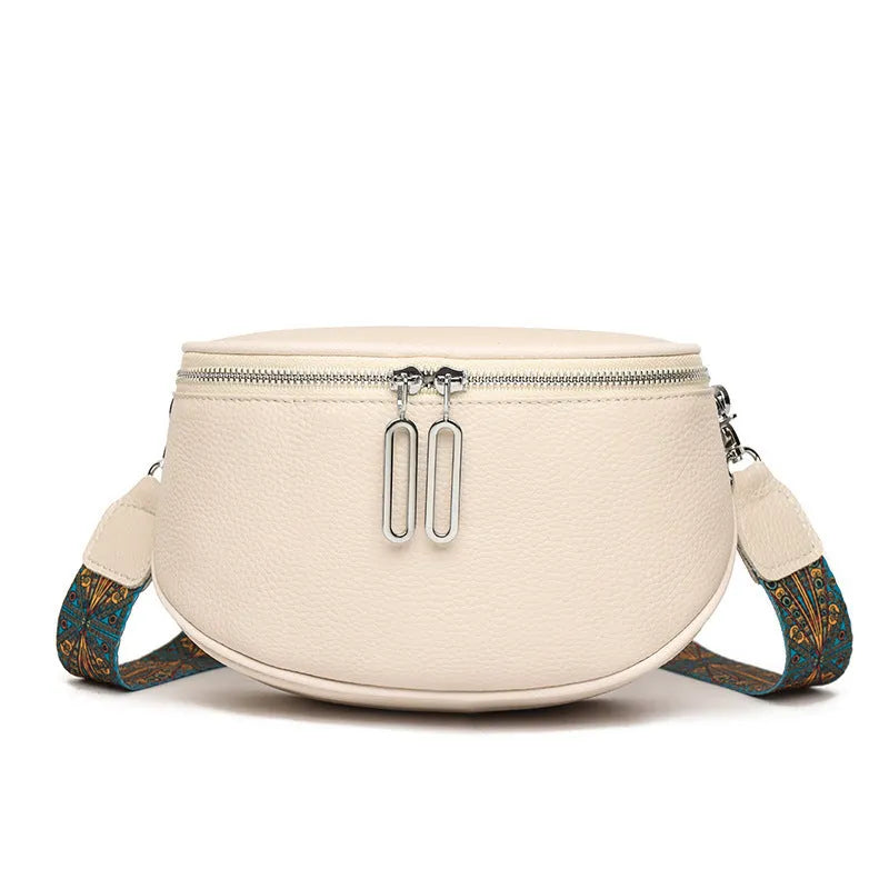 Women's soft PU leather messenger bag in saddle shape with crossbody strap and zip compartment
