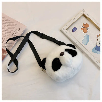 Plush panda head crossbody bag with cylindrical shape measuring 18x15x8cm, showing sandwich pocket and soft texture