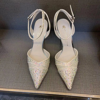 Women's hollow high heels with red sole, stiletto heel, and pointed toe in silver or black colours
