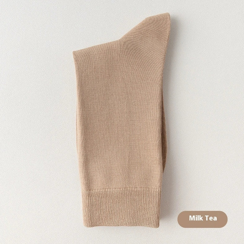 Mid-calf business socks in solid colours with combed cotton construction and deodorant function