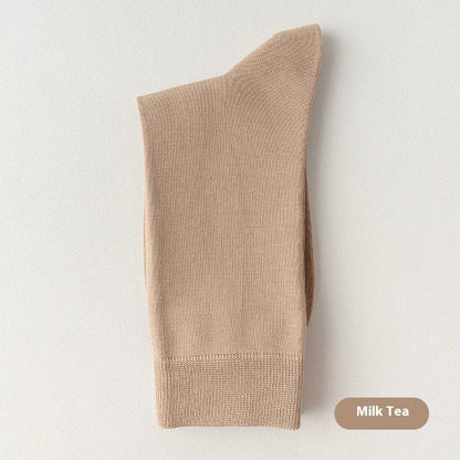 Mid-calf business socks in solid colours with combed cotton construction and deodorant function