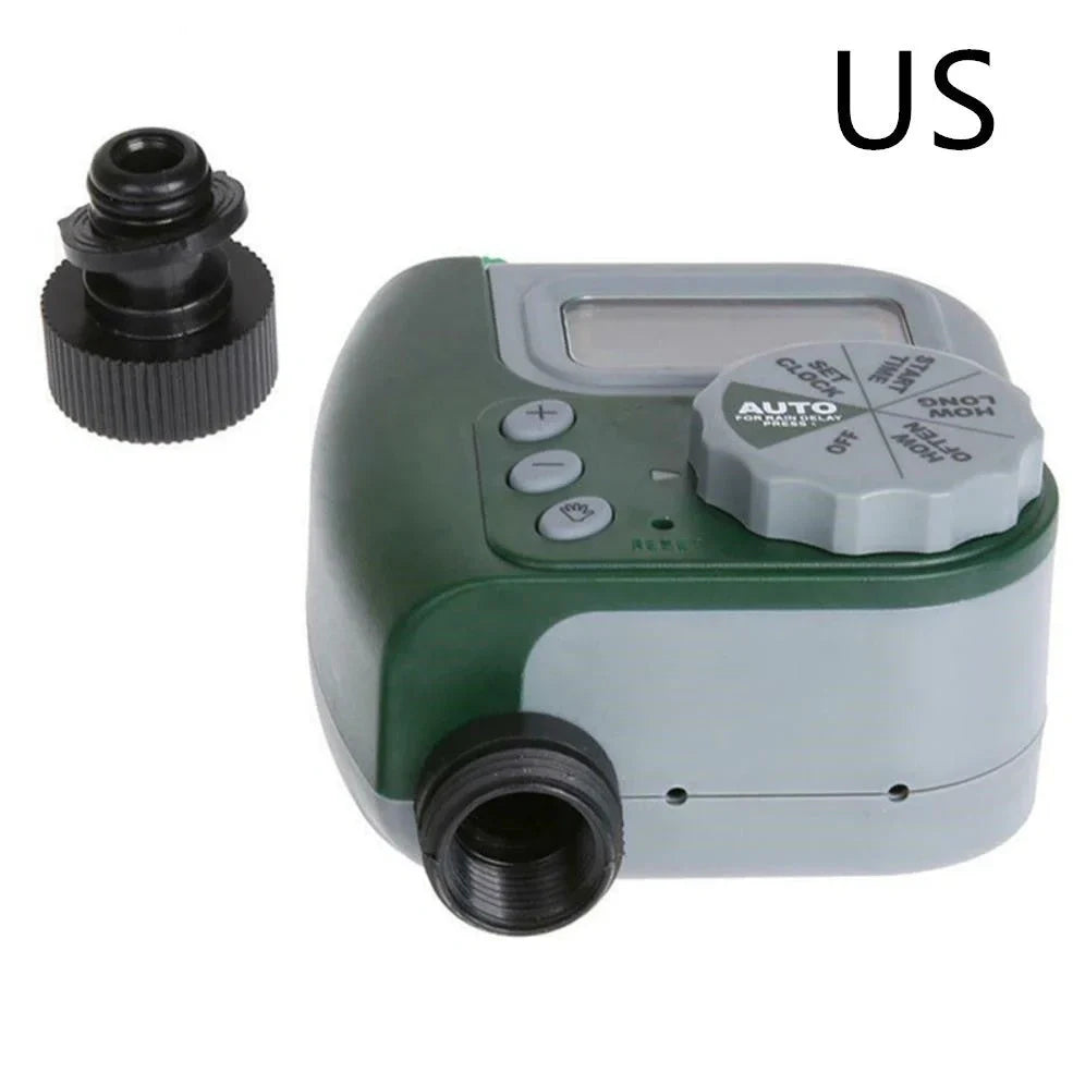 Green garden irrigation controller with LCD display and rotating dial for programming watering schedules