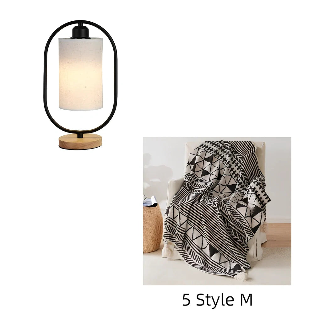 Black metal bedside lamp with dimming button and 5W LED warm light on wooden table