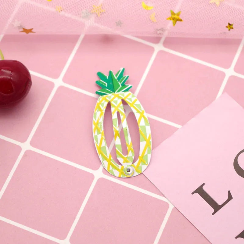 Colourful metal hair barrettes for children with printed watermelon, strawberry, pineapple and Christmas designs.