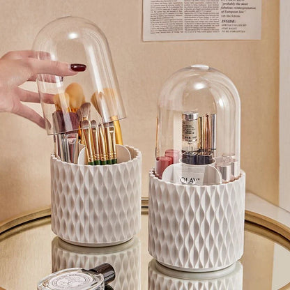 Rotating makeup brush holder with transparent cover, designed for organization and protection of cosmetic tools