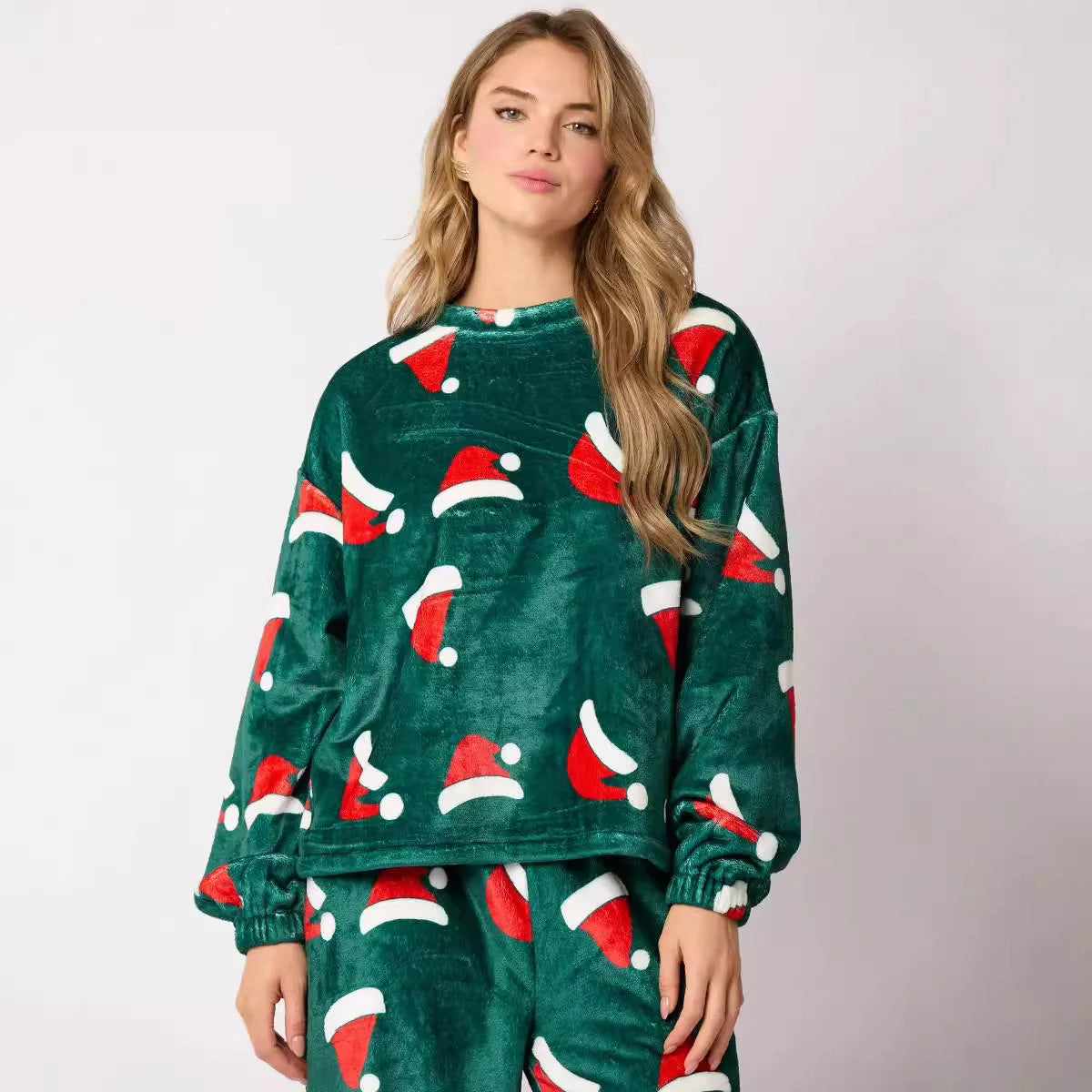 Cozy Christmas-themed flannel pajama sets for women featuring Santa Claus and festive holiday designs