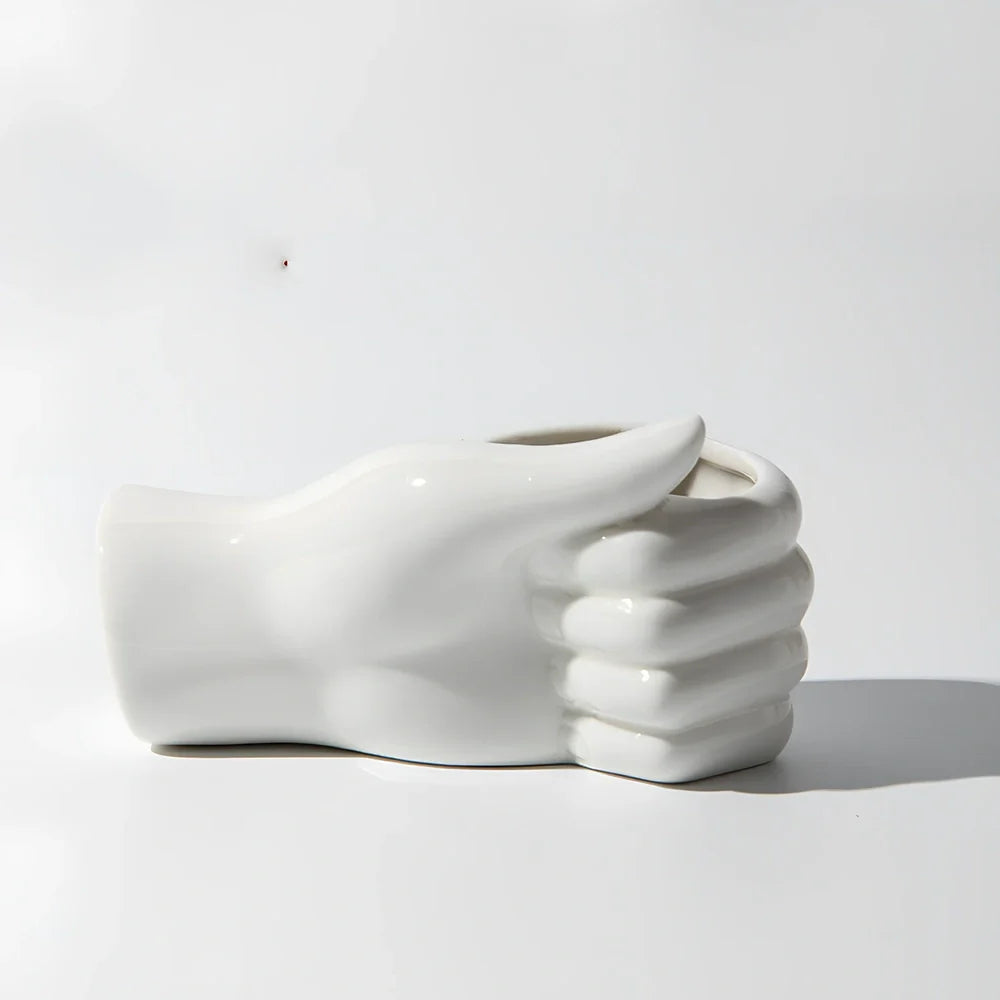 Ceramic human body vase with colour glaze finish showing decorative figures patterns, displayed as hanging ornament