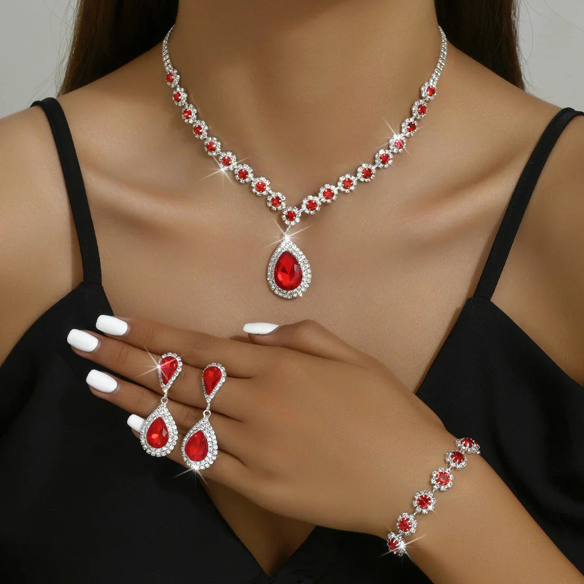 Elegant bridal jewelry set with necklace, earrings, and bracelet in various colors including white, blue, red, and green