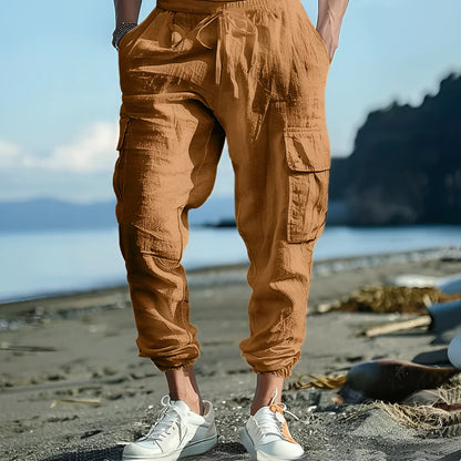 Men's linen trousers with ankle ties and multiple pockets in solid colour