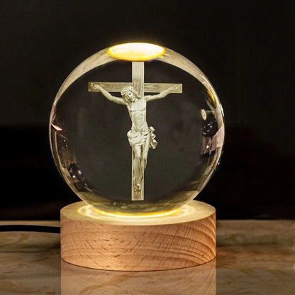 White crystal ball ornament with solid wood warm light base, showing purity engravings like Cross and Maria for desk decor
