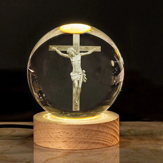 White crystal ball ornament with solid wood warm light base, showing purity engravings like Cross and Maria for desk decor