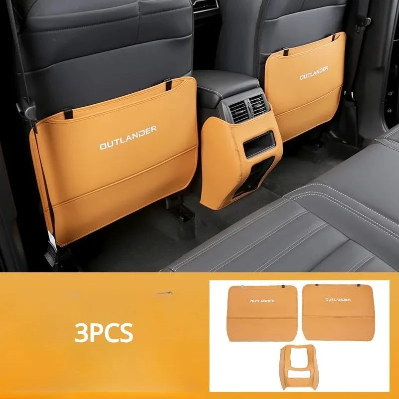 Set of three leather anti-kick protection pads for a Mitsubishi Outlander car interior.
