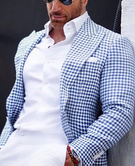 Men's slim fit two-button suit jacket with large top-stitch pockets in a polyester blend fabric.