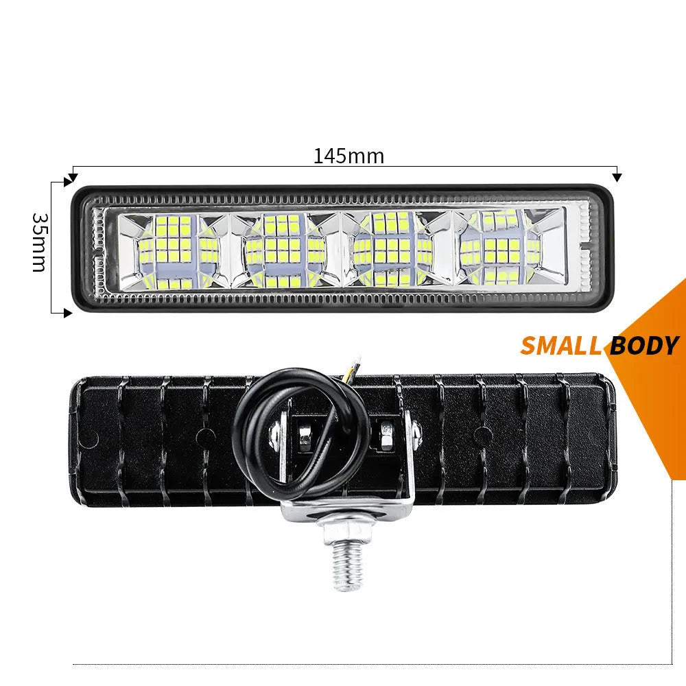 Pack of four rectangular aluminium LED work lights for car and truck modification.