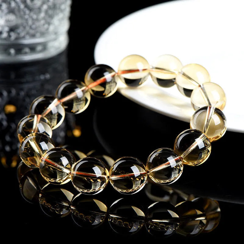 Natural citrine scattered beads bracelet showing adjustable design with polished gemstone beads in amber tones