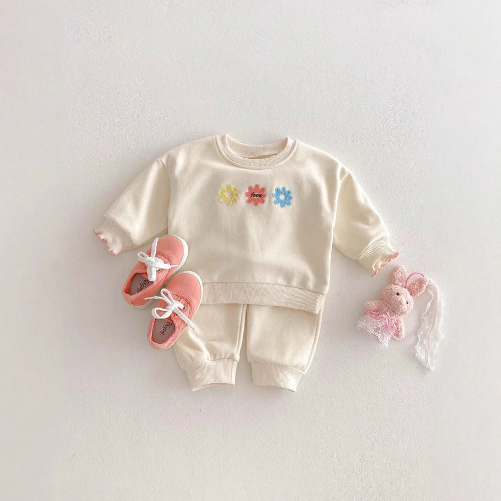 Light beige cotton sweatshirt and sweatpants set with small flower print for girls