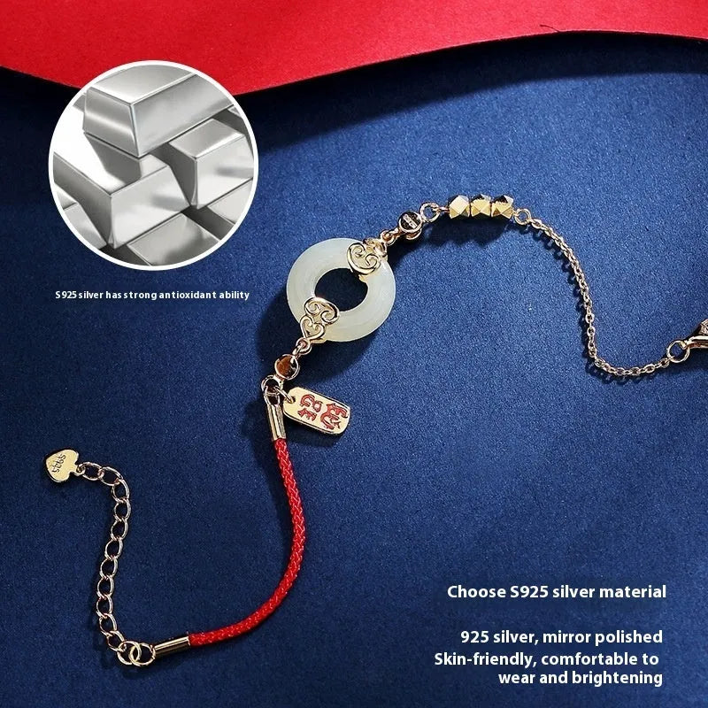 Chinese style Hetian jade and 925 sterling silver jewellery set with bracelet, necklace, and earrings.